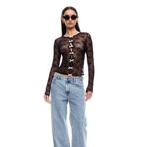 Black lace top with white bow details in front